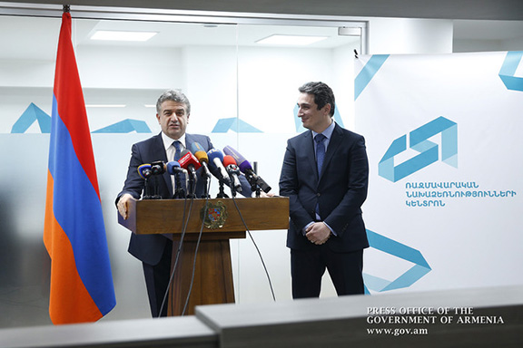 Prime Minister Karen Karapetyan speaks at opening ceremony of GCSI in Yerevan on Jan. 12, 2017, accompanied by the center's Executive Director, Aleksandr Khachaturyan (Photo: gov.am)