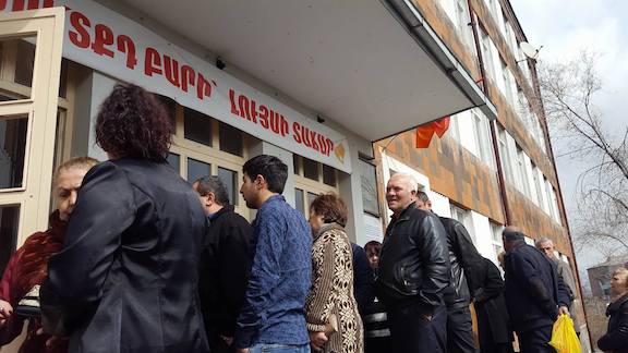 Voter line up at a polling place on Sunday for the Parliamentary Elections (Photo by Razmig Sarkissian)