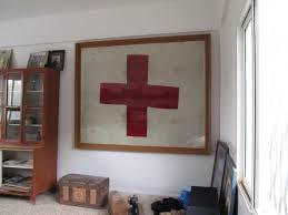 The flag with the red cross displayed at a home in Anjar, Lebanon