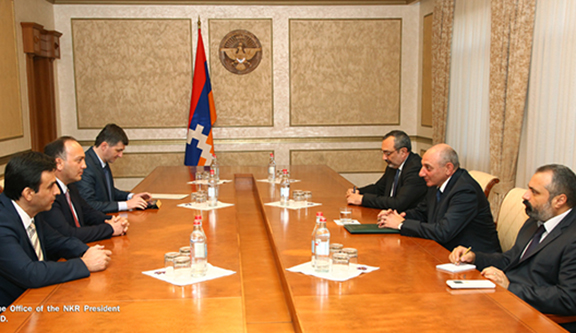 Abkhazia's Foreign Minister Daur Kove (left) meets with Artsakh President Bako Sahakian