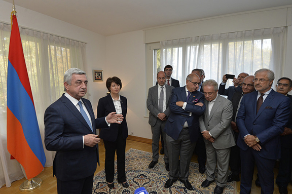 President Serzh Sarkisian briefs Armenian community members at the Armenian Embassy in Geneva on Oct. 16