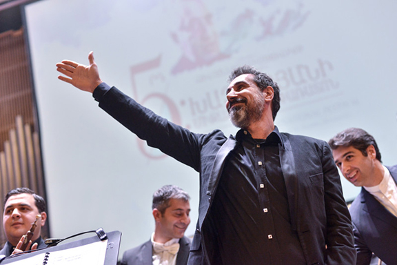 Serj Tankian appearing on stage at the Aram Khachaturian Concert Hall (Photo: State Youth Orchestra of Armenia)