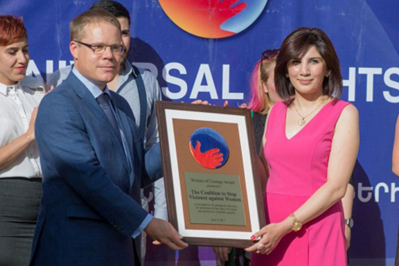 Hasmik Khachatryan receiving Woman of Courage award from international organizations and civil society in Armenia