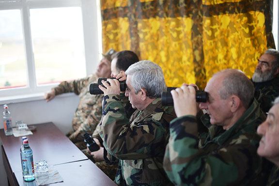 President Serzh Sarkisian (left) and Artsakh President Bako Sahakian watch military exercises in Artsakh on Sarturday