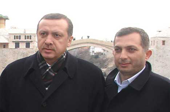 Turkish President Recep Tayyip Erdogan (left) with Metin Kulunk who reportedly funded a bike gang to violently protest Germany Armenian Genocide recognition