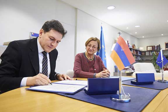 Ambassador Paruyr Hovhannisyan signs the Istanbul Convention as Deputy Secretary General of the Council of Europe,Gabriella Battaini-Dragoni looks on