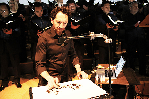 Kevork Mourad creating visual illustrations during Los Angeles Master Chorale's concert at Disney Hall. (Photo by Patrick Brown).