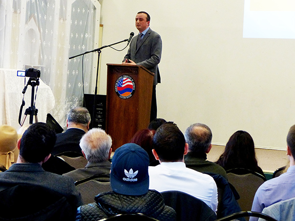 Robert Avetisyan, Permanent Representative of the Republic of Artsakh to the U.S., addresses a packed house at the Soorp Khatch Armenian Church Arabian Hall.