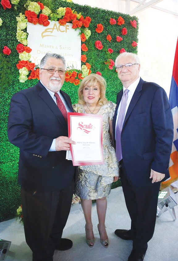 California State Senator Anthony Portantino presents a proclamation to Meher and Satig Der Ohanessian