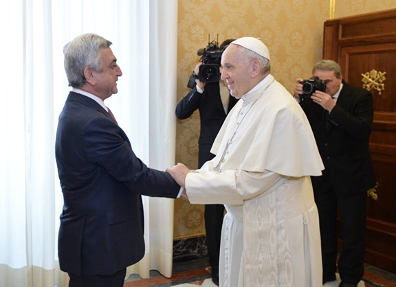 Pope Francis greets President Serzh Sarkisian on Thursday at the Vatican