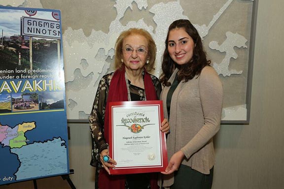 Arda Tchakian (right), District Representative of Senator Anthony J. Portantino, presents honoree Haigoush Keghinian Kohler (left) with a Certificate of Recognition
