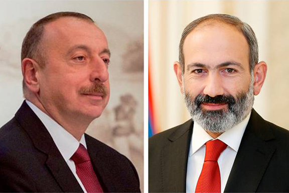 Azerbaijan;s President Ilham Aliyev (left) and Armenia's Prime Minister Nikol Pashinyan
