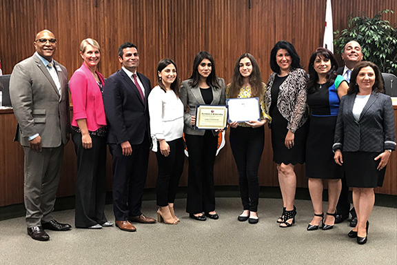 ANCA Glendale was joined by GUSD members to award scholarships to two recipients (center)