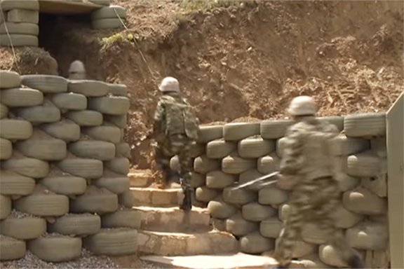 Azerbaijani soldiers are shown at the border with Artsakh in a video for disseminated by the Azerbaijani Defense Ministry