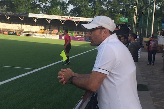 Western Armenia coach Araik Adamian watching his players.