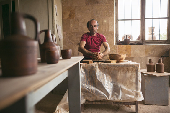 Potter Vahagn Hambardzumyan in his workshop in Sisian, Armenia. He and his wife Zara will bring their Sisian Ceramics family operation to Washington, D.C., for the Festival. (Photo by Narek Harutyunyan, Smithsonian Institution)