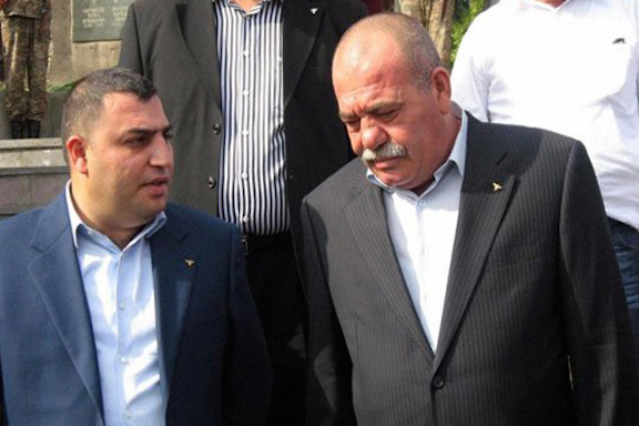 Former mayor Karen Grigoryan with his remanded father, Manvel Grigoryan.