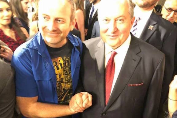 Blogger Alexander Lapshin shaking hands with President of Armenia Armen Sarkissian.