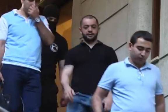 Former President Serzh Sarkisian's nephew, Hayk, is being escorted by NSS officers on Wedneday. His father, Aleksander (Sashik) was also detained