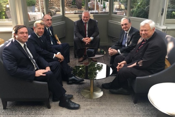 The Armenian and Azerbaijani foreign ministers meeting in Brussels with the OSCE Co-Chairs present.