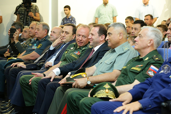 Russian Deputy Defense Minister Alexander Fomin (center left) with Armenia's Defense Minister David Tonoyan on Friday in Yerevan