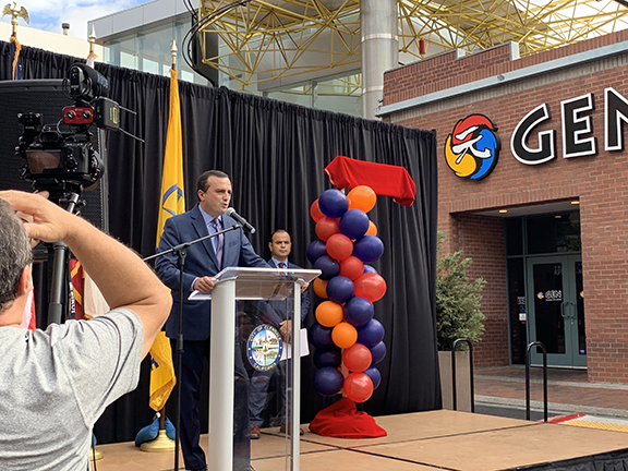 Artsakh's Permanent Representative to the US, Robert Avetisyan addresses the crowd during the street designation