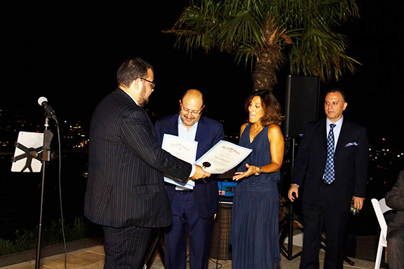 Hosts Drs. Gary Kevorkian and Sona Kazazyan receive a commendation o behalf of Los Angeles City Councilmember Paul Koretz