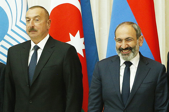 Acting Prime Minister Nikol Pashinyan (right) with Azerbaijani President Ilham Aliyev in St. Petersburg, Russia on Dec. 6