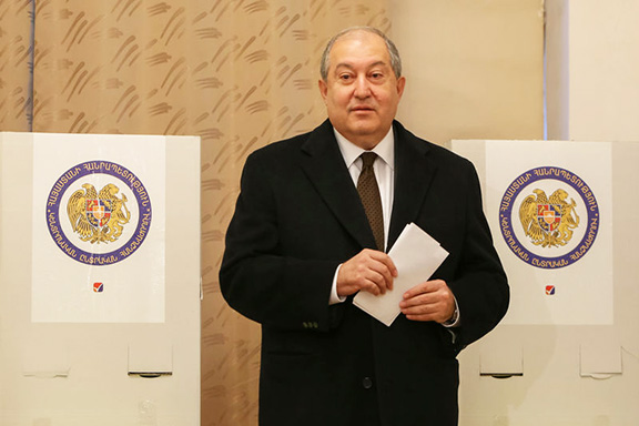 Armenian President Armen Sarkissian votes during Sunday's election (Photo by Photolur)