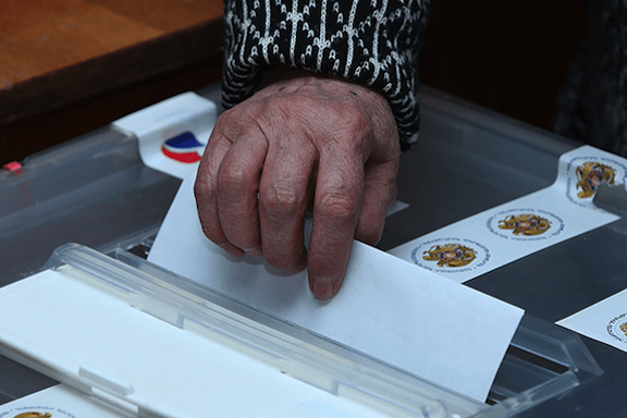 A person voting during Dec. 9 2018 election