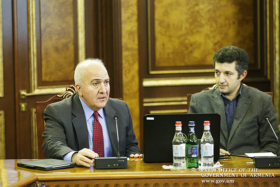 New Ventures Funds general partner Harry Glorikian (left) and Director of Armenia’s National Academy of Science’s Molecular Biology Institute Arsen Arakelyan present the details of the project.