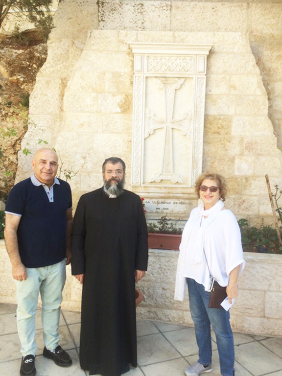 At the church backyard with reverent Avedis