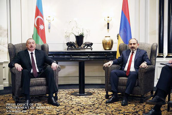 Prime Minister Nikol Pashinyan met with Azerbaijani President Ilham Aliyev (left) in Vienna on March 29