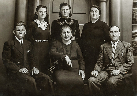 Portait of Arshaluys Yousuf (seated) with 5 of her 6 childen. Standing directly above her is author Alice Nazarian