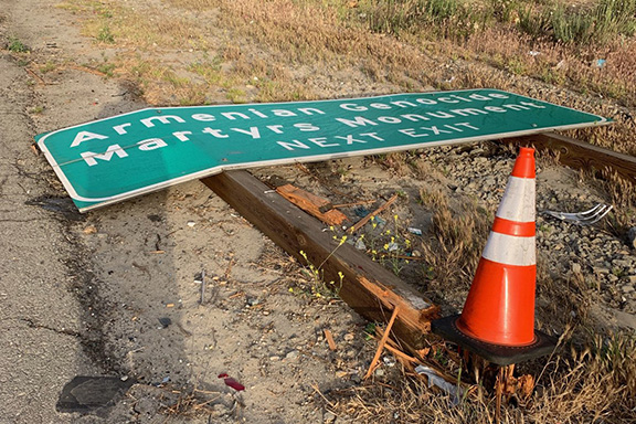 The freeway sign directing drivers to the Montebello Armenian Genocide Martyrs Monument has been downed