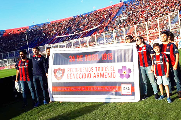 San Lorenzo soccer team with their sign: "Let Us All Remember the Armenian Genocide"