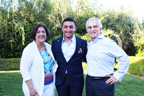Army veteran Arman Vardanyan (center) with Dr. Shahe and Ani Yeni-Komshian