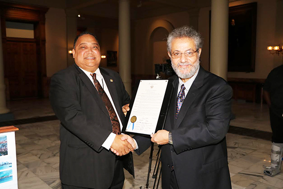 Atlanta City Councilman Michael Julian Bond presents ANC of Georgia Chairman Dr. Sarkis Agasarkisan with the 2019 Atlanta City Council Resolution Commemorating the Armenian Genocide