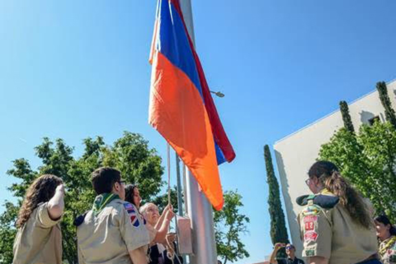 Raising of the Armenian flag by Armenian scouts