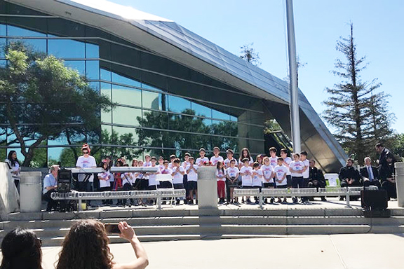 Students of Charlie Keyan Armenian community school singing In front of Fresno City Hall