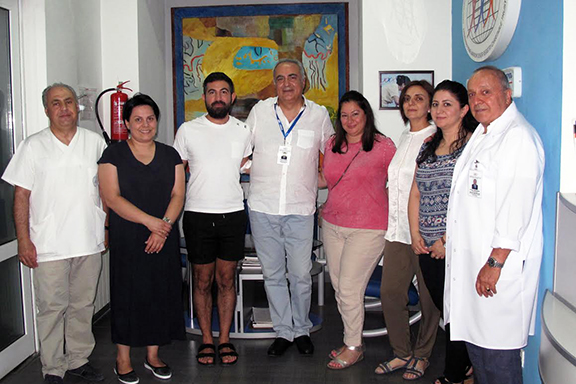 Aram (third from left) and his sister, Ani (fifth from left), with ABMDR Board members and the executive staff of the organization’s Stem Cell Harvesting Center, in Yerevan
