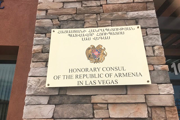 A plaque at the the entrance of Armenian's commercial real estate office