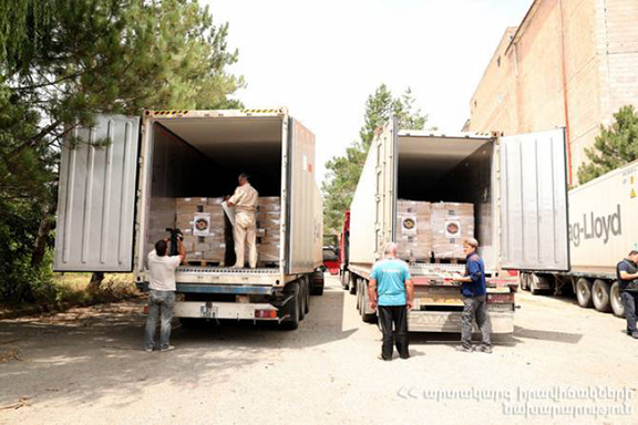 Trucks are loaded with humanitarian suppliers headed to Syria in yet another shipment from Armenia