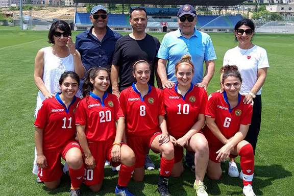 The Armenian American team members with a few of their parents