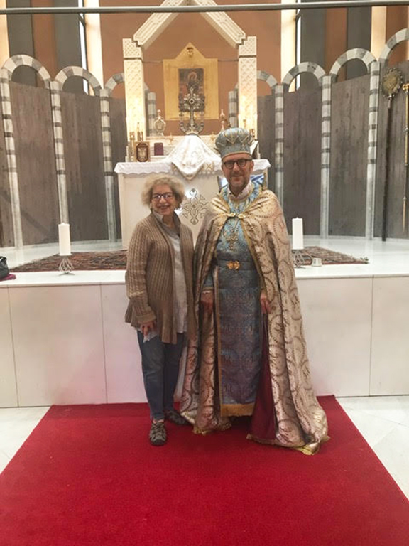 Catherine Yesayan with Father Zadik Avedikian