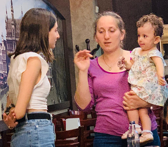Armine Beglaryan (center) and Nane (far right) Beglaryan, the Ombudsman's wife and daughter