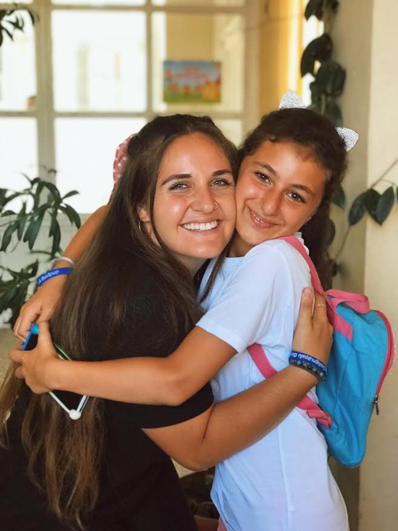 Hanna Mansour with a camper