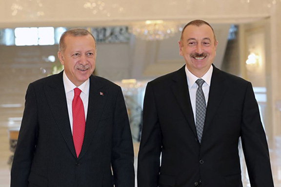 Turkish President Recep Tayyip Erdogan and Azerbaijani President Ilham Aliyev at the Summit of Turkic Nations in Baku this week