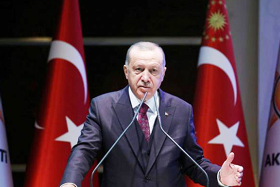 Turkish President Recep Tayyip Erdogan speaks to his AKP on Oct. 30