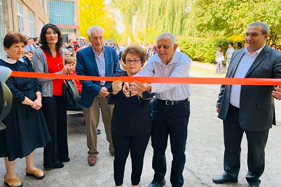 From left to right: Neshan Peroomian, Alice and Vahik Petrossian, and Saratak School Principal Edvard Grigoryan